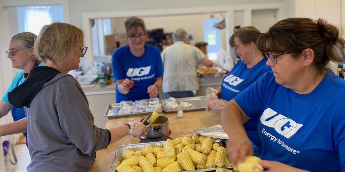 UGI volunteers boil corn for residents affected by Westfield flooding.